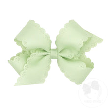 Load image into Gallery viewer, Eyelet embossed grosgrain bow
