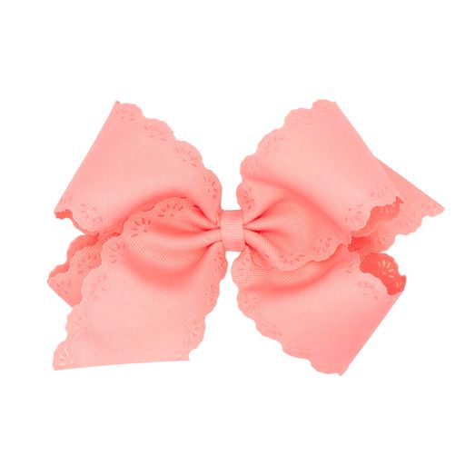 Eyelet embossed grosgrain bow