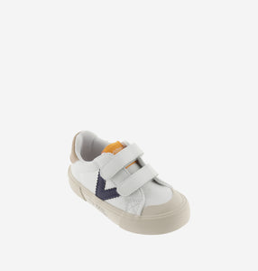 White sneaker with navy V detail and cream sole