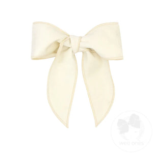 Velvet fabric bow with twisted wrap and whimsy tails