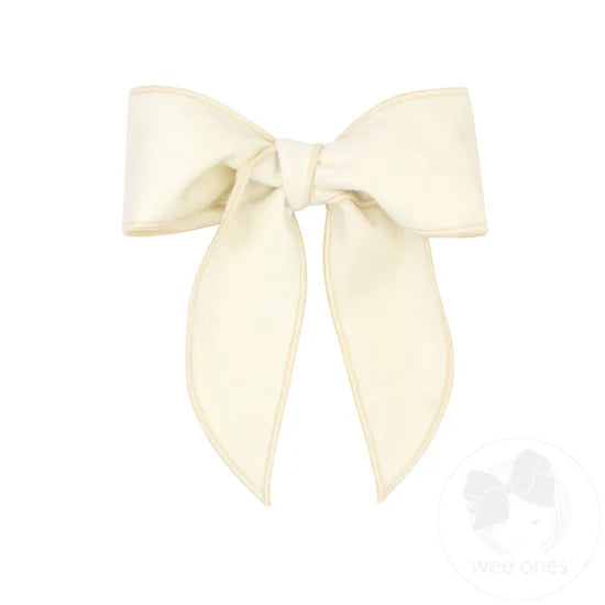 Velvet fabric bow with twisted wrap and whimsy tails
