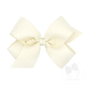 Antique white scalloped edge grosgrain bow