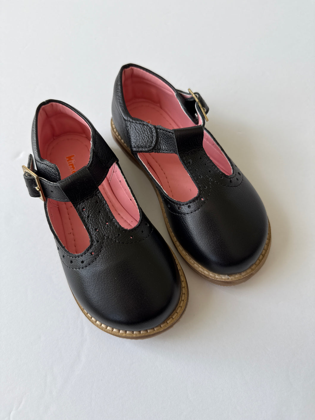 Black leather tstrap shoe