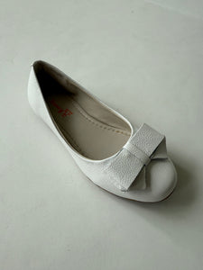 White ballet flat with bow