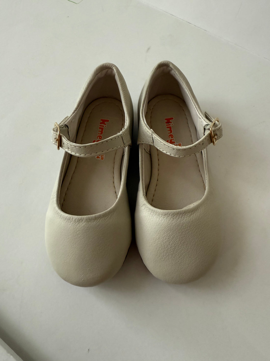Beige mary jane with buckle closure
