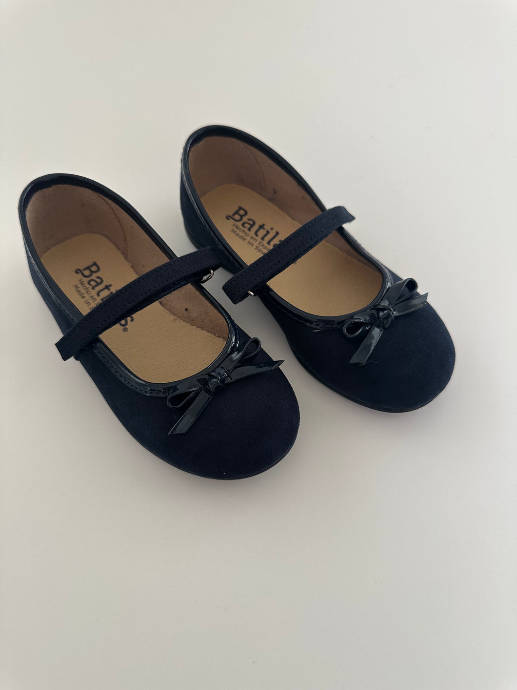 Navy serratex mary jane with patent bow