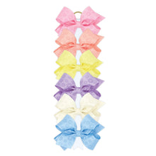 Load image into Gallery viewer, Flower embossed grosgrain bows
