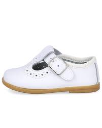 White tstrap leather shoe with dots details