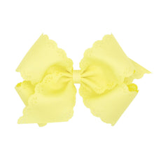 Load image into Gallery viewer, Eyelet embossed grosgrain bow
