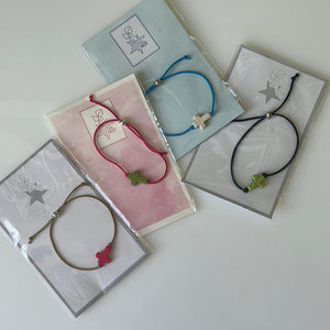Elastic bracelet with cross