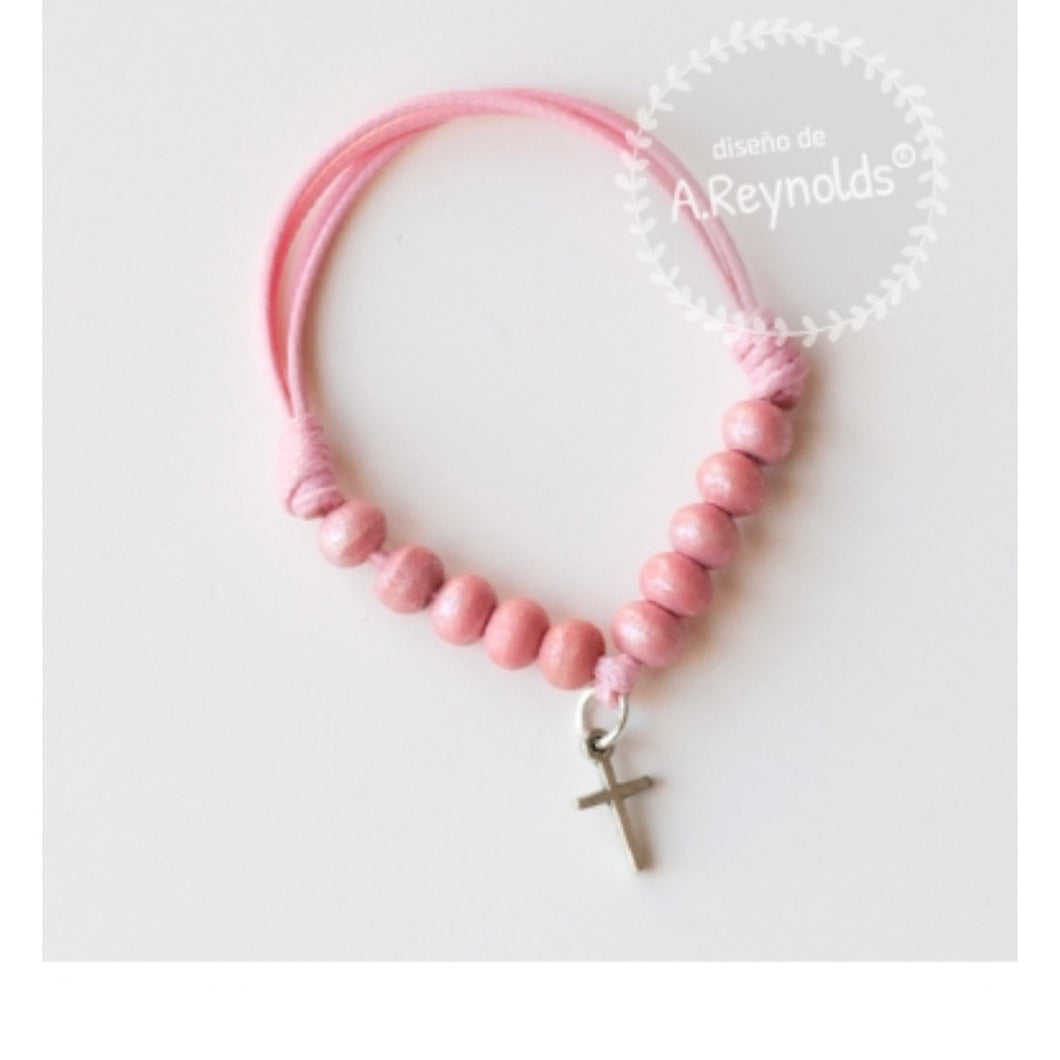 Pink bracelet with cross