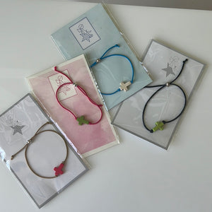 Elastic bracelet with cross
